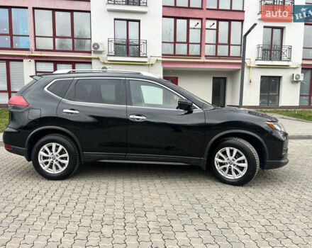 Черный Ниссан Rogue, объемом двигателя 2.5 л и пробегом 170 тыс. км за 13250 $, фото 2 на Automoto.ua