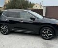 Черный Ниссан Rogue, объемом двигателя 2.5 л и пробегом 100 тыс. км за 12000 $, фото 1 на Automoto.ua