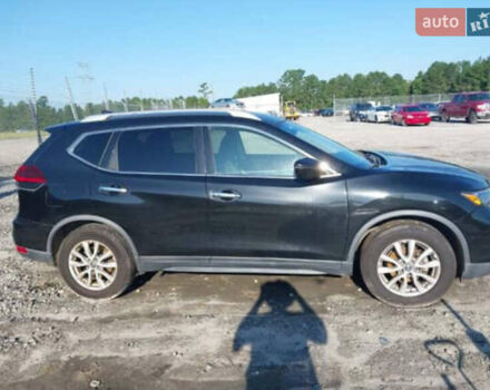 Черный Ниссан Rogue, объемом двигателя 2.5 л и пробегом 138 тыс. км за 11000 $, фото 2 на Automoto.ua