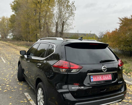 Черный Ниссан Rogue, объемом двигателя 2.49 л и пробегом 58 тыс. км за 16000 $, фото 3 на Automoto.ua