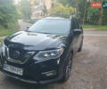 Черный Ниссан Rogue, объемом двигателя 2.49 л и пробегом 127 тыс. км за 19000 $, фото 1 на Automoto.ua