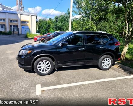 Черный Ниссан Rogue, объемом двигателя 2.5 л и пробегом 129 тыс. км за 12500 $, фото 1 на Automoto.ua