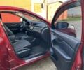 Червоний Ніссан Rogue, об'ємом двигуна 2 л та пробігом 117 тис. км за 14500 $, фото 4 на Automoto.ua