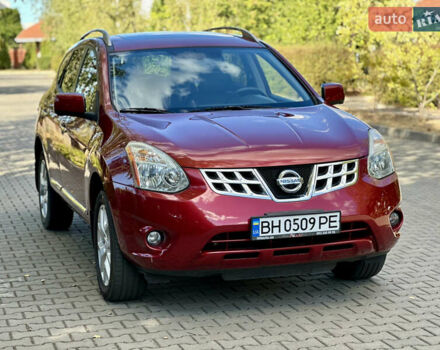 Красный Ниссан Rogue, объемом двигателя 2.49 л и пробегом 210 тыс. км за 9500 $, фото 3 на Automoto.ua