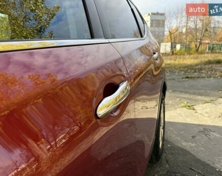 Ниссан Rogue 2014 в Киеве на Automoto.ua Красный Ниссан Rogue, объемом двигателя 2.49 л и пробегом 126 тыс. км за 12300 $, фото 5 на Automoto.ua