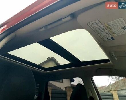 Красный Ниссан Rogue, объемом двигателя 2.49 л и пробегом 184 тыс. км за 12000 $, фото 8 на Automoto.ua