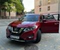 Красный Ниссан Rogue, объемом двигателя 2.49 л и пробегом 135 тыс. км за 16999 $, фото 1 на Automoto.ua