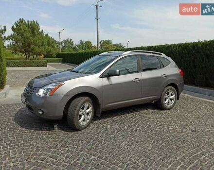 Серый Ниссан Rogue, объемом двигателя 2.5 л и пробегом 340 тыс. км за 6600 $, фото 1 на Automoto.ua
