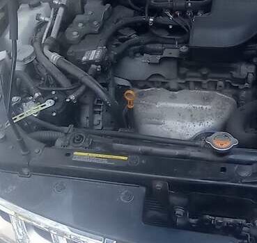 Серый Ниссан Rogue, объемом двигателя 2.5 л и пробегом 220 тыс. км за 10000 $, фото 15 на Automoto.ua