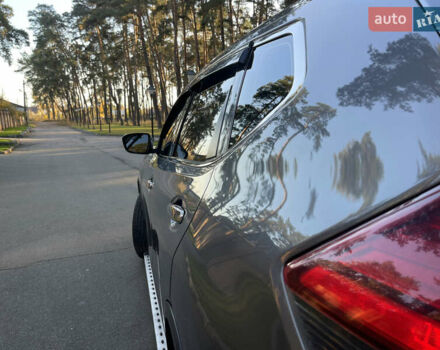 Серый Ниссан Rogue, объемом двигателя 2.5 л и пробегом 112 тыс. км за 13400 $, фото 7 на Automoto.ua