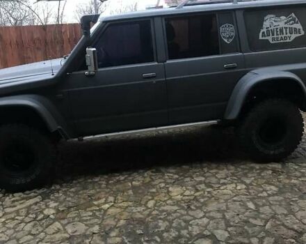 Серый Ниссан Сафари, объемом двигателя 4.2 л и пробегом 250 тыс. км за 13000 $, фото 1 на Automoto.ua