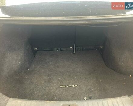 Черный Ниссан Сентра, объемом двигателя 1.8 л и пробегом 150 тыс. км за 7000 $, фото 29 на Automoto.ua
