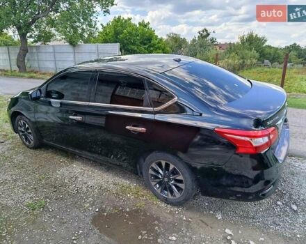 Черный Ниссан Сентра, объемом двигателя 1.8 л и пробегом 161 тыс. км за 11000 $, фото 1 на Automoto.ua