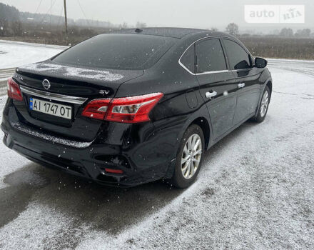 Чорний Ніссан Сентра, об'ємом двигуна 1.8 л та пробігом 65 тис. км за 11000 $, фото 5 на Automoto.ua