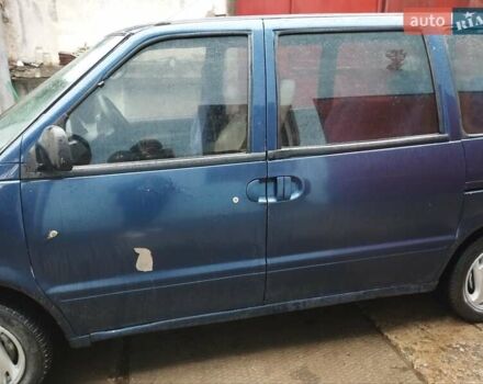 Синий Ниссан Серена, объемом двигателя 1.6 л и пробегом 250 тыс. км за 2000 $, фото 4 на Automoto.ua