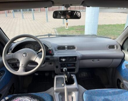 Зелений Ніссан Сєрєна, об'ємом двигуна 2 л та пробігом 350 тис. км за 599 $, фото 9 на Automoto.ua