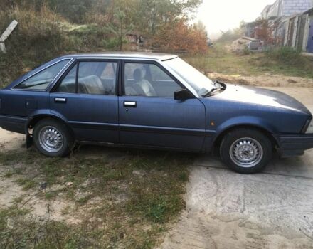 Синий Ниссан Станза, объемом двигателя 1.8 л и пробегом 214 тыс. км за 500 $, фото 1 на Automoto.ua