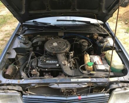 Синий Ниссан Станза, объемом двигателя 1.8 л и пробегом 214 тыс. км за 500 $, фото 7 на Automoto.ua