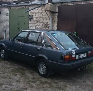 Синій Ніссан Станза, об'ємом двигуна 1.8 л та пробігом 217 тис. км за 1100 $, фото 9 на Automoto.ua