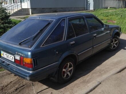 Синий Ниссан Станза, объемом двигателя 1.6 л и пробегом 449 тыс. км за 37000 $, фото 1 на Automoto.ua