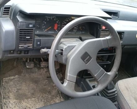 Білий Ніссан Санні, об'ємом двигуна 1 л та пробігом 270 тис. км за 350 $, фото 5 на Automoto.ua