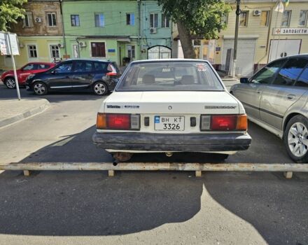 Белый Ниссан Санни, объемом двигателя 1.5 л и пробегом 262 тыс. км за 500 $, фото 3 на Automoto.ua