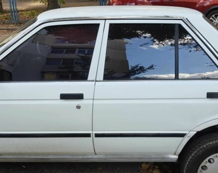 Белый Ниссан Санни, объемом двигателя 1.7 л и пробегом 280 тыс. км за 1033 $, фото 6 на Automoto.ua