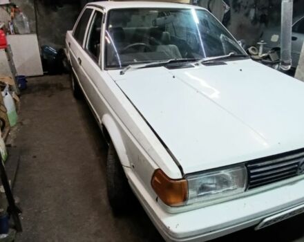 Белый Ниссан Санни, объемом двигателя 1.3 л и пробегом 240 тыс. км за 475 $, фото 2 на Automoto.ua