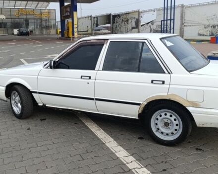 Белый Ниссан Санни, объемом двигателя 1.3 л и пробегом 260 тыс. км за 550 $, фото 4 на Automoto.ua