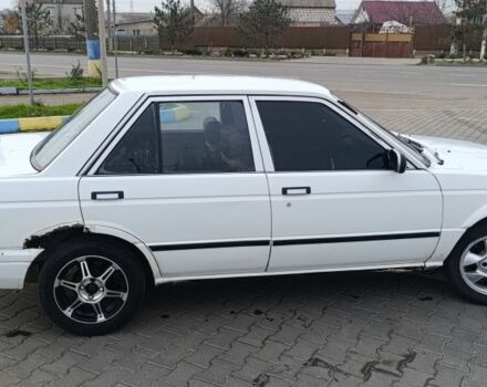 Белый Ниссан Санни, объемом двигателя 1.3 л и пробегом 260 тыс. км за 550 $, фото 2 на Automoto.ua