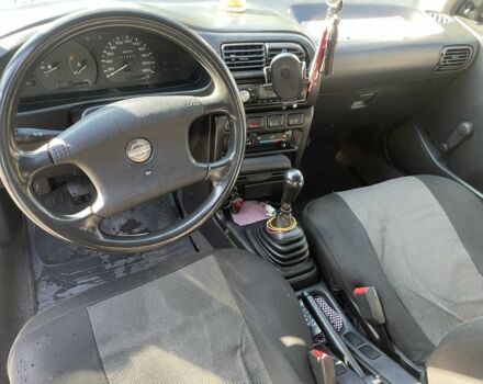 Белый Ниссан Санни, объемом двигателя 1.4 л и пробегом 280 тыс. км за 1500 $, фото 2 на Automoto.ua