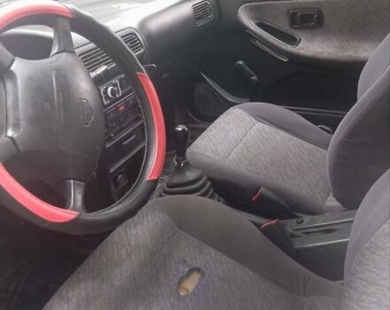 Белый Ниссан Санни, объемом двигателя 1.97 л и пробегом 470 тыс. км за 2500 $, фото 3 на Automoto.ua