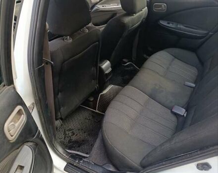 Белый Ниссан Санни, объемом двигателя 1.8 л и пробегом 214 тыс. км за 3068 $, фото 3 на Automoto.ua