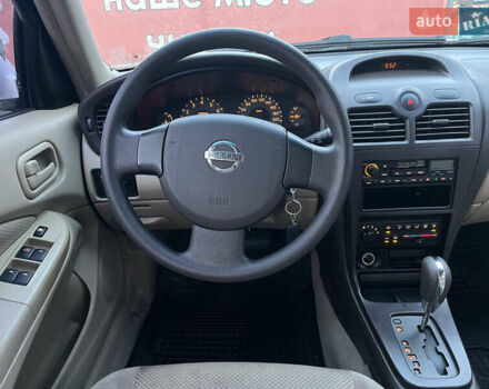 Білий Ніссан Санні, об'ємом двигуна 1.6 л та пробігом 174 тис. км за 6000 $, фото 11 на Automoto.ua