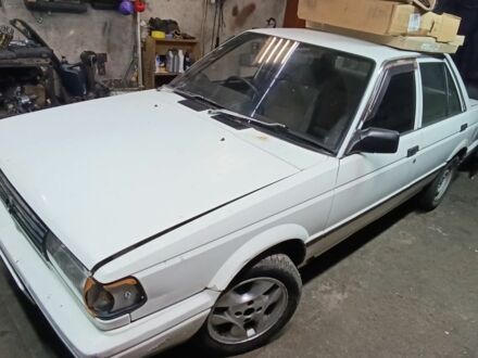 Белый Ниссан Санни, объемом двигателя 1.3 л и пробегом 240 тыс. км за 475 $, фото 1 на Automoto.ua