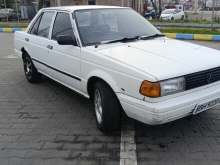 Белый Ниссан Санни, объемом двигателя 1.3 л и пробегом 260 тыс. км за 550 $, фото 1 на Automoto.ua