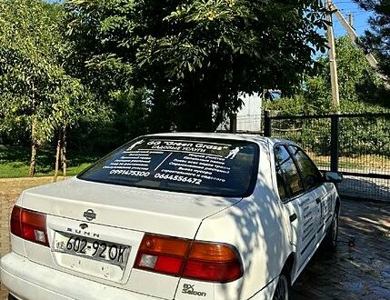 Белый Ниссан Санни, объемом двигателя 1.5 л и пробегом 298 тыс. км за 1440 $, фото 1 на Automoto.ua