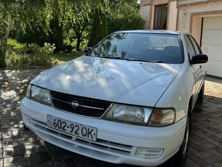 Белый Ниссан Санни, объемом двигателя 1.5 л и пробегом 298 тыс. км за 1100 $, фото 1 на Automoto.ua