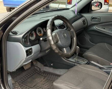 Чорний Ніссан Санні, об'ємом двигуна 1.6 л та пробігом 250 тис. км за 5400 $, фото 6 на Automoto.ua