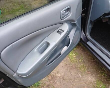 Чорний Ніссан Санні, об'ємом двигуна 1.6 л та пробігом 182 тис. км за 3600 $, фото 17 на Automoto.ua