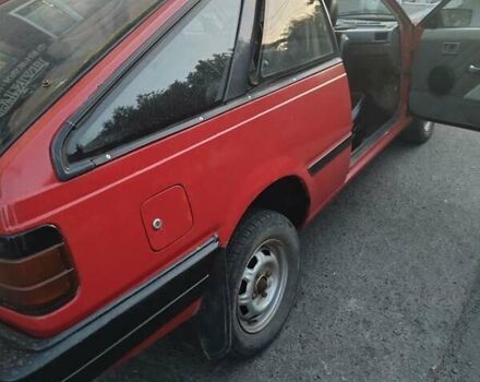 Красный Ниссан Санни, объемом двигателя 1.5 л и пробегом 318 тыс. км за 950 $, фото 1 на Automoto.ua