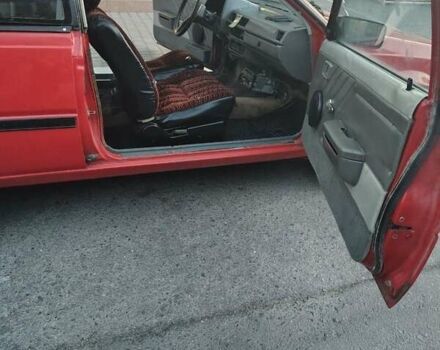 Красный Ниссан Санни, объемом двигателя 1.5 л и пробегом 318 тыс. км за 950 $, фото 7 на Automoto.ua