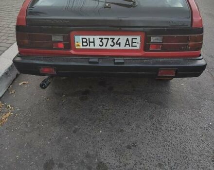 Красный Ниссан Санни, объемом двигателя 1.5 л и пробегом 318 тыс. км за 950 $, фото 13 на Automoto.ua