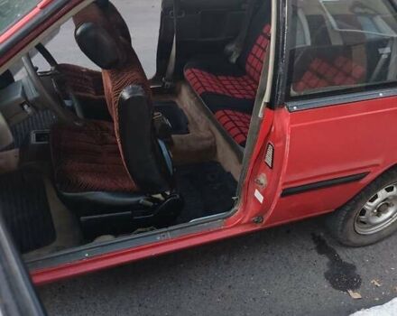 Красный Ниссан Санни, объемом двигателя 1.5 л и пробегом 318 тыс. км за 950 $, фото 5 на Automoto.ua