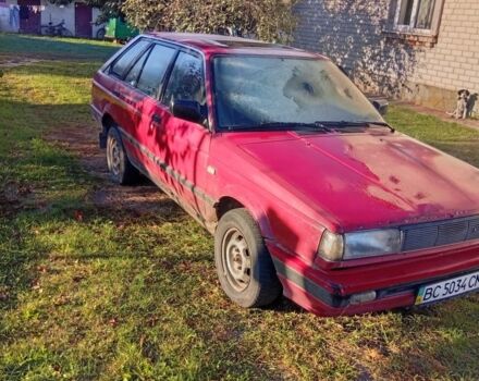 Красный Ниссан Санни, объемом двигателя 1 л и пробегом 600 тыс. км за 850 $, фото 1 на Automoto.ua