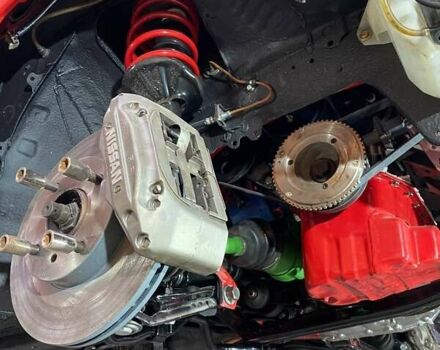 Красный Ниссан Санни, объемом двигателя 1.81 л и пробегом 300 тыс. км за 19999 $, фото 21 на Automoto.ua