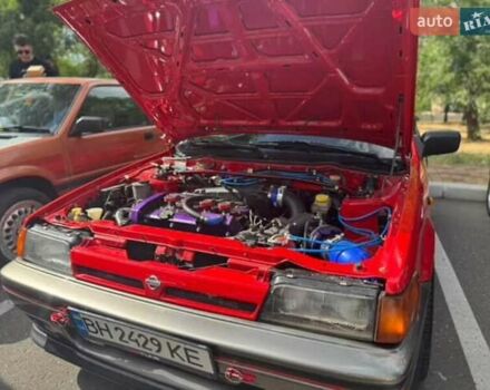 Красный Ниссан Санни, объемом двигателя 1.81 л и пробегом 300 тыс. км за 19999 $, фото 2 на Automoto.ua
