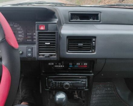 Червоний Ніссан Санні, об'ємом двигуна 1.6 л та пробігом 235 тис. км за 800 $, фото 9 на Automoto.ua