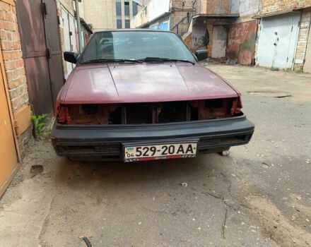 Красный Ниссан Санни, объемом двигателя 1.6 л и пробегом 210 тыс. км за 400 $, фото 1 на Automoto.ua