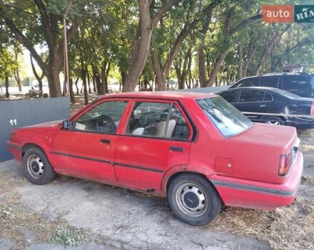 Червоний Ніссан Санні, об'ємом двигуна 1.3 л та пробігом 264 тис. км за 800 $, фото 2 на Automoto.ua